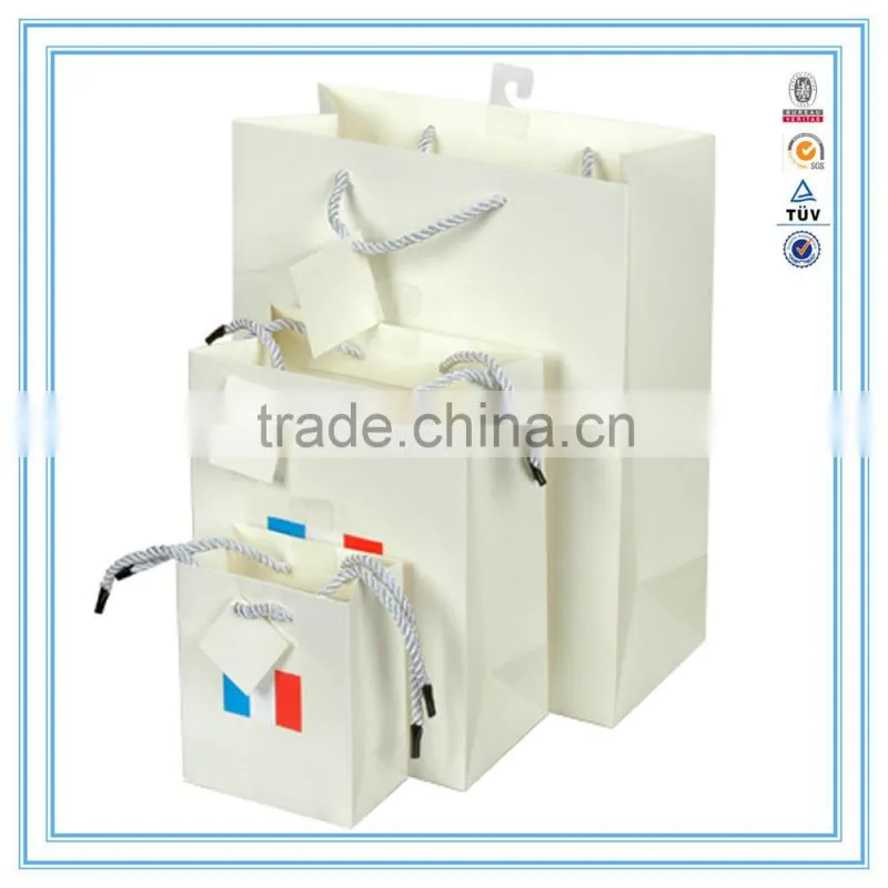 Alibaba china custom white luxury paper bag & brand paper bag printing logo with handles