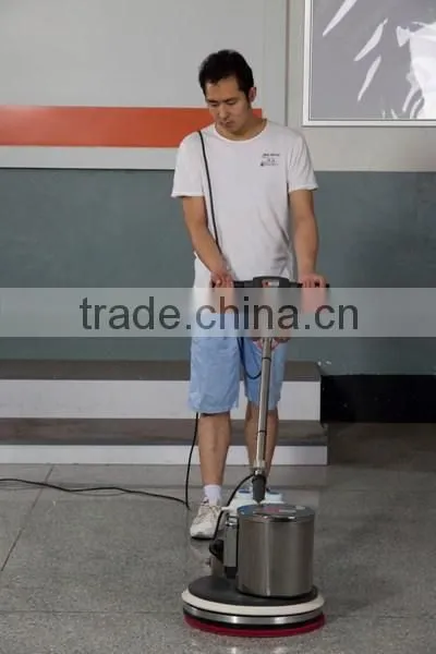 Hand held floor polishing machine