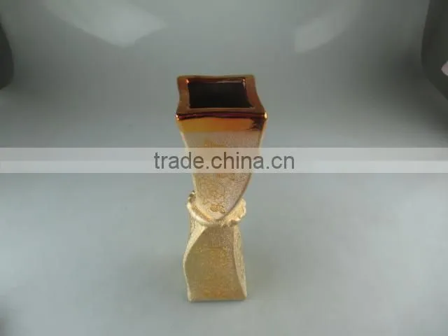 beautiul golden porcelain type vase with flower design