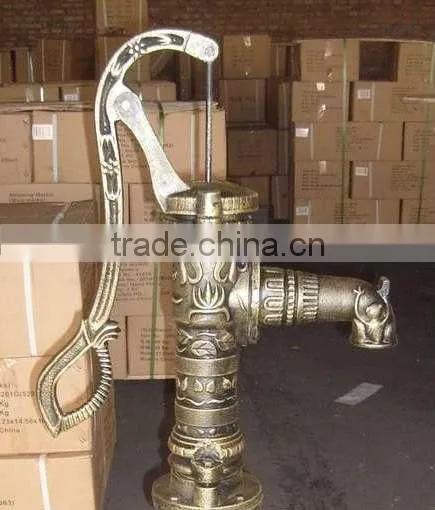 cast iron hand pump garden villiage using