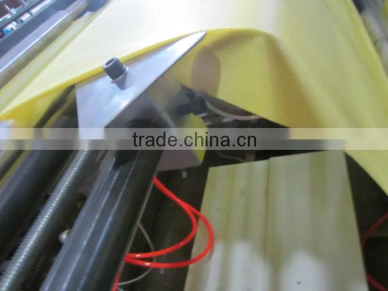 Computer Non woven roll embossed - punched - sheets cutting machine
