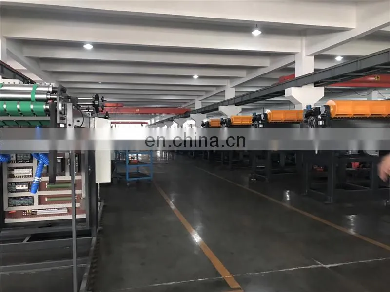UCM1900A High Speed 4 Roll Automatic Paper cutting slitting Machine with conveyor belt stacker