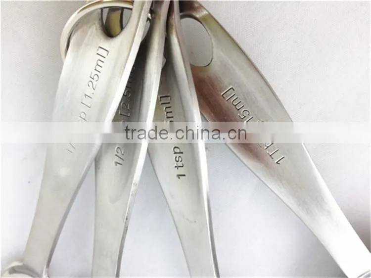 Stainless steel measuring scoop
