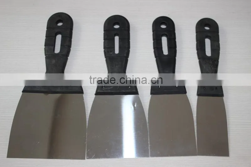 Wall scraper with PC handle
