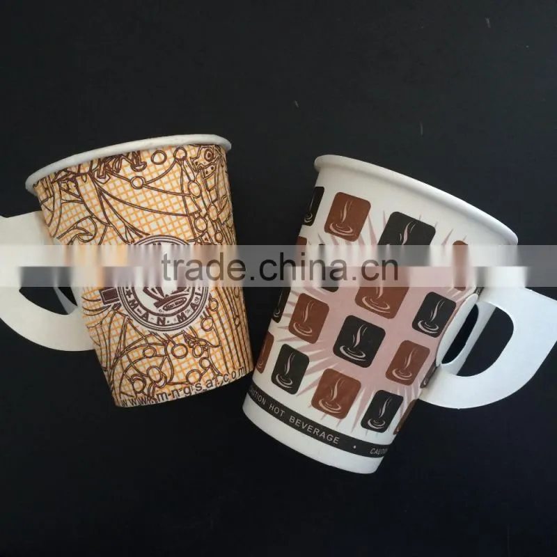 Disposable paper coffee cup with handles