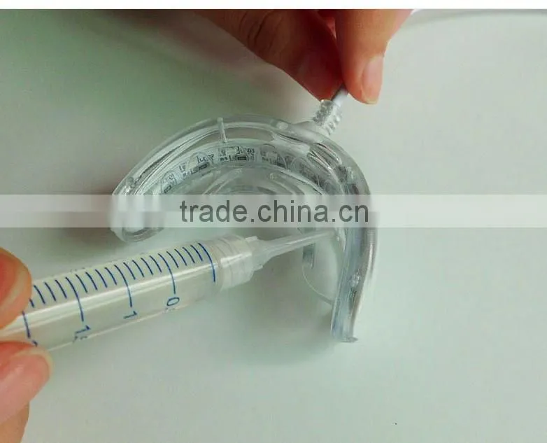 Datahero 16 LED cold light teeth whitening machine using on the phone