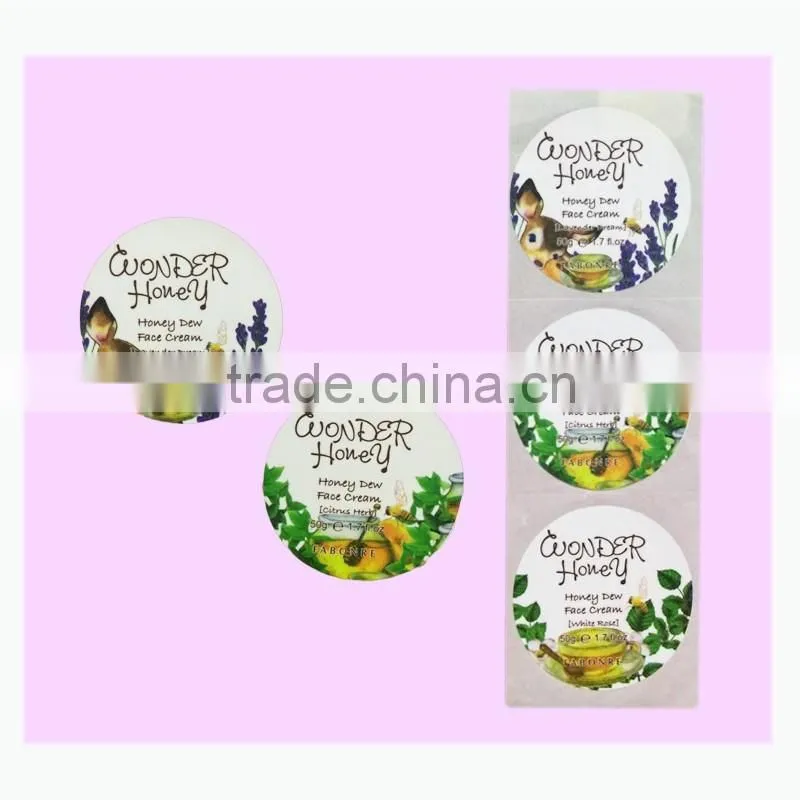 Round adhesive sticker label used in face cream bottle