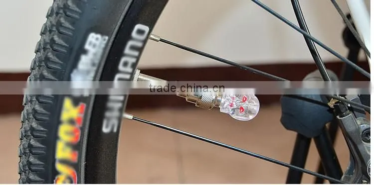 2016 Skull Head led Bike Bicycle Car Motorcycle Wheel Valve Stem Cap tire Motion Neon Light lamp