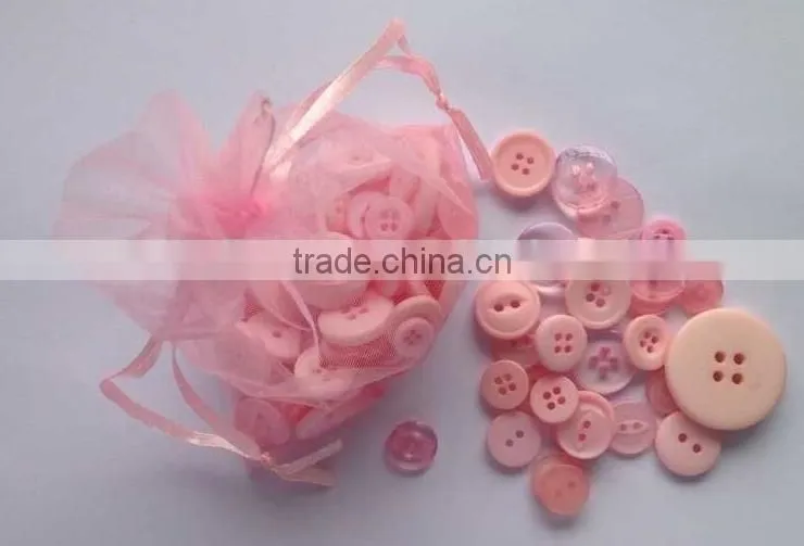 Assorted sizes pink buttons for kids handicraft making and decoration