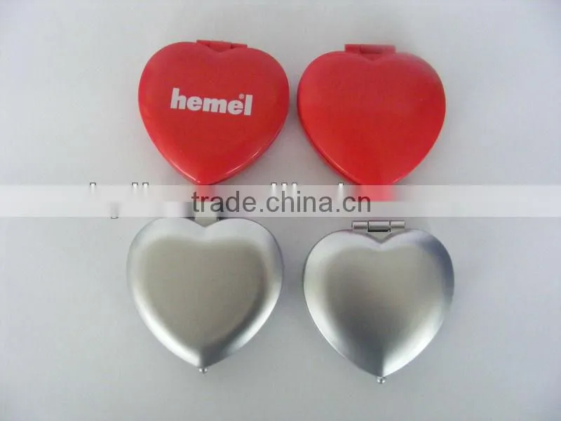 double side plastic cosmetic mirror .