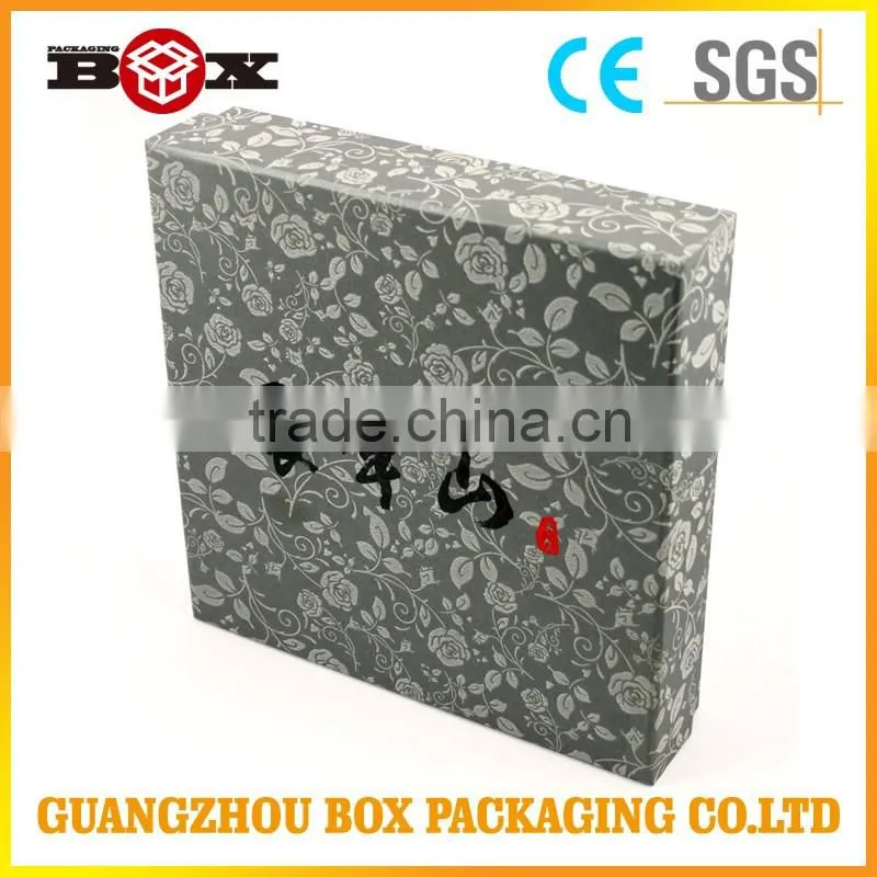 Plain black paper gift box with stamped logo