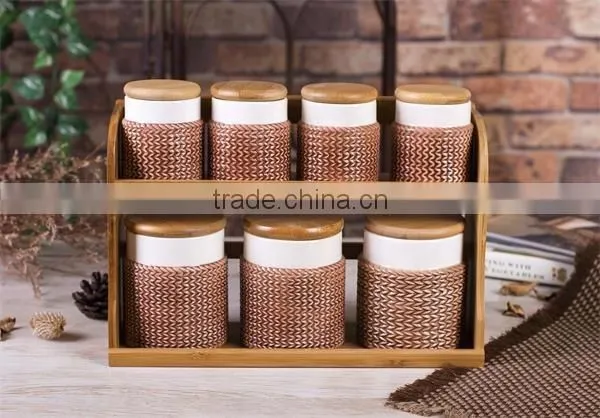 Brown Embossed 7 PCs Ceramic Food Jars Set with Bamboo Lid and Iron Stand