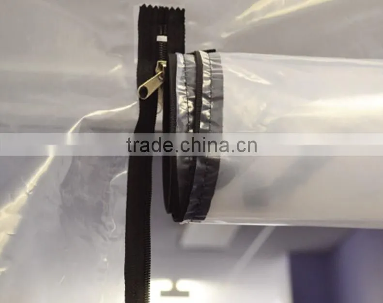 Plastic film protection and dust barrier zipper door