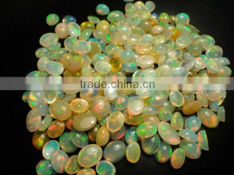 Natural Ethiopian Fire Opal oval cabochon cut beads