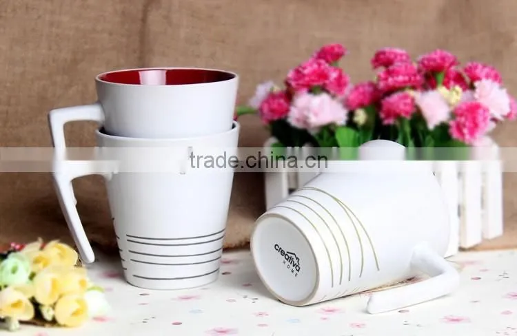 High quality stoneware tea mug with unique handle from china