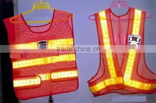 road safety warning red high visibility vest