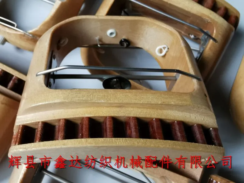 弧形织带机帽带梭.jpg