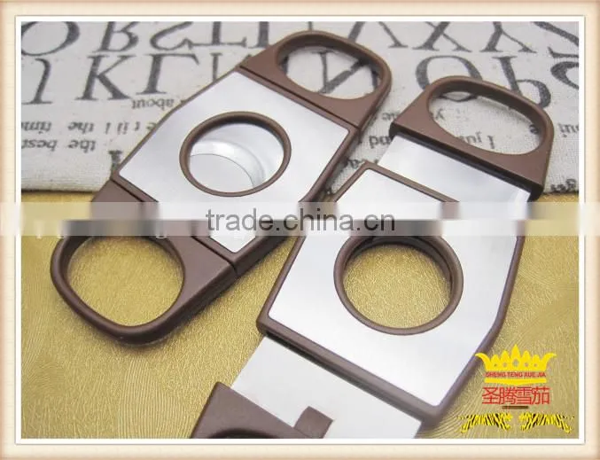 Red plastic cigar scissors, cigar cutter