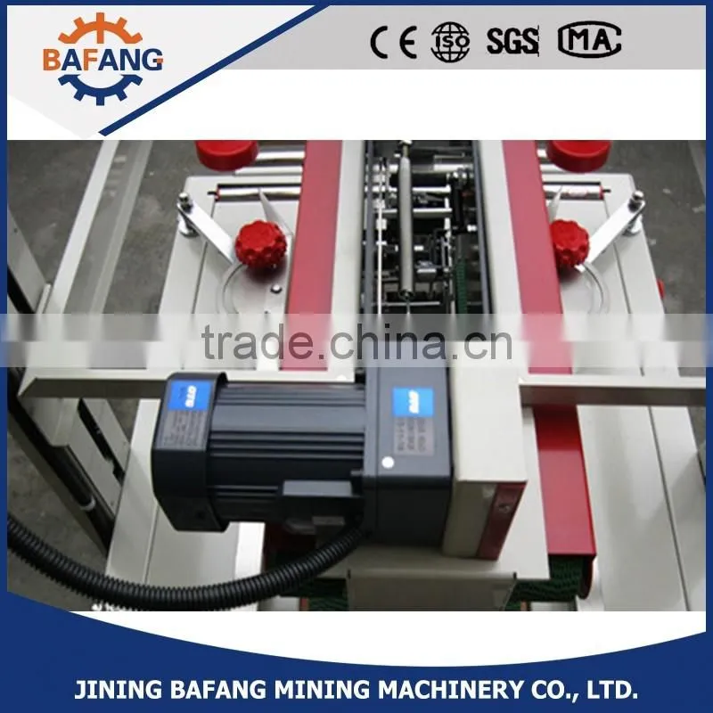 Semi-auto boxes sealing strapping machine