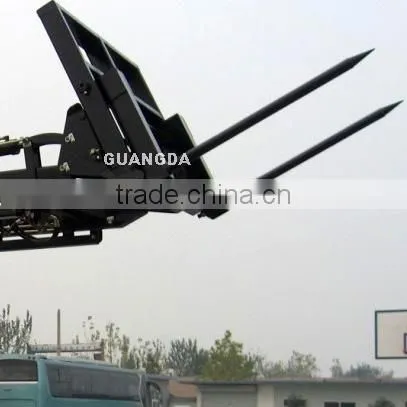 Bale spear loader for farm tractors