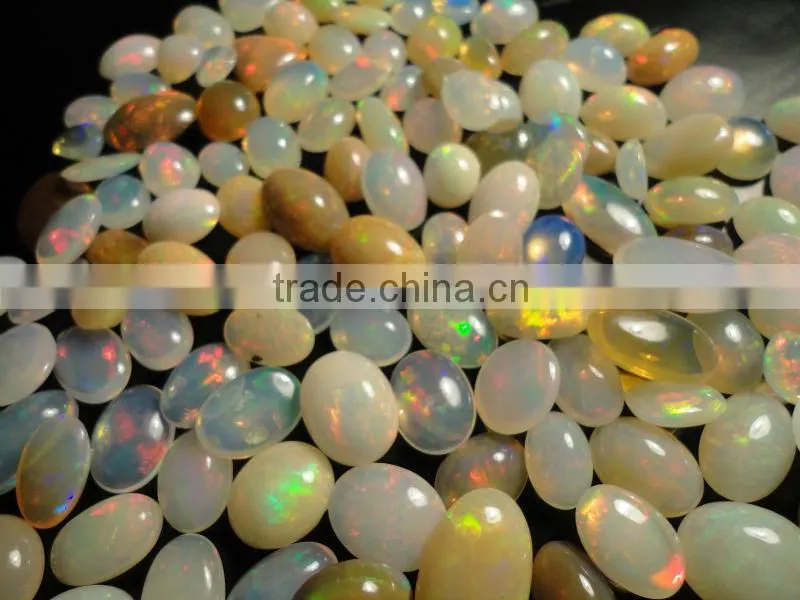 Natural Ethiopian Fire Opal oval cabochon cut beads