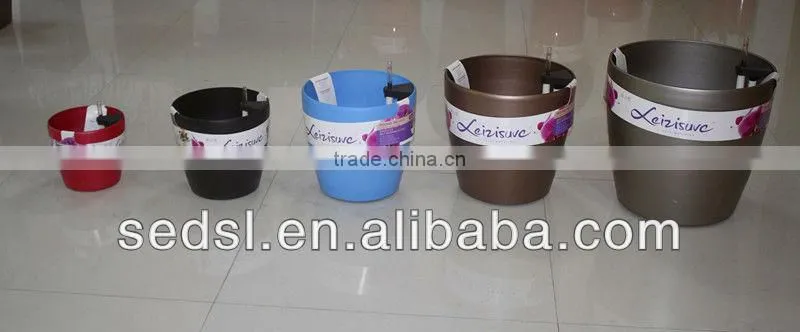 wholesale round plastic self watering planters