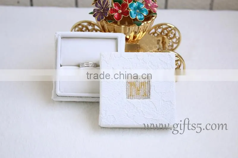 White wedding boxes for ring package with beaded name plate of M