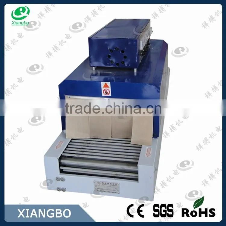 Automatic heating shrink wrapping packing machine