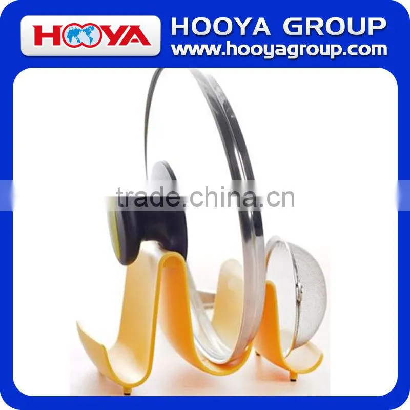 multifuntional lid holder