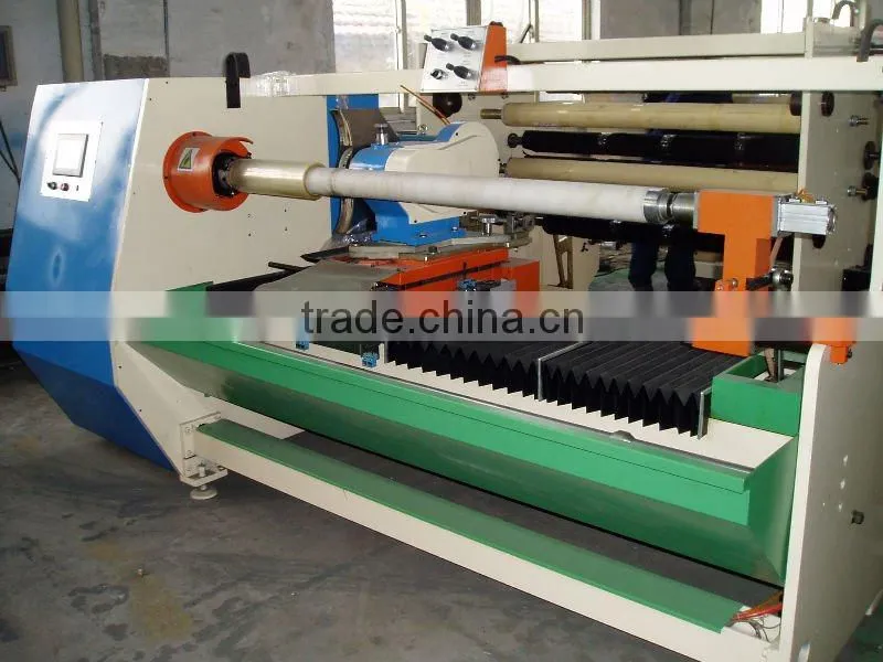 Jumbo roll single shaft tape films cutting machine