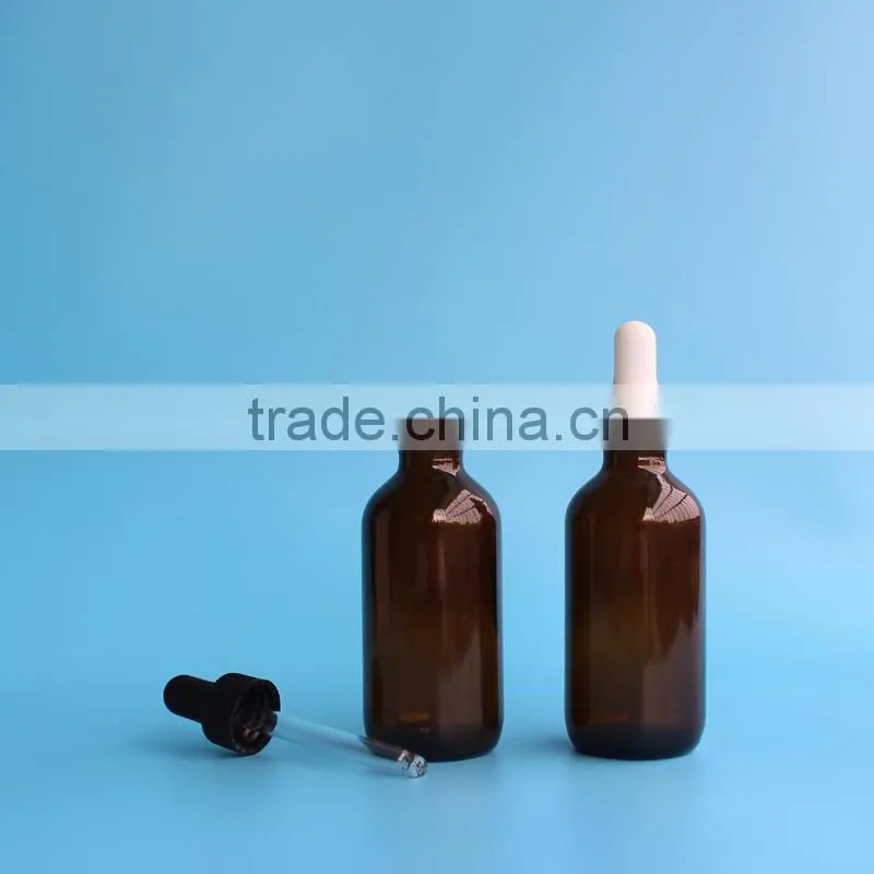 2 oz glossy amber boston round glass bottle with dropper