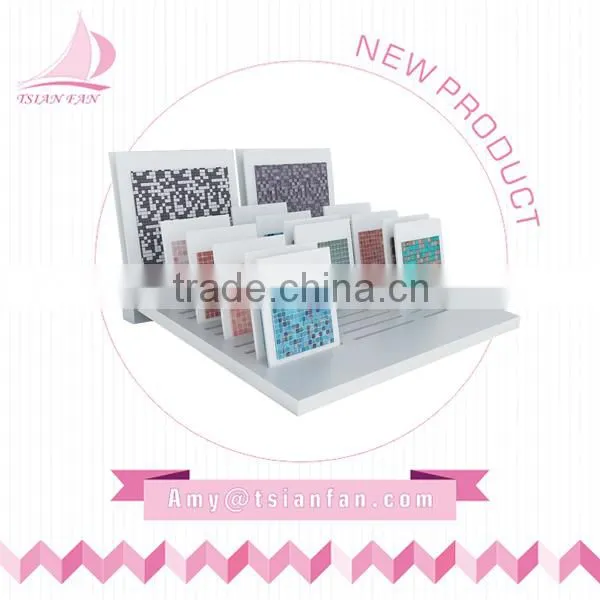 mosaic tile and mable stone iron display rack in showroom