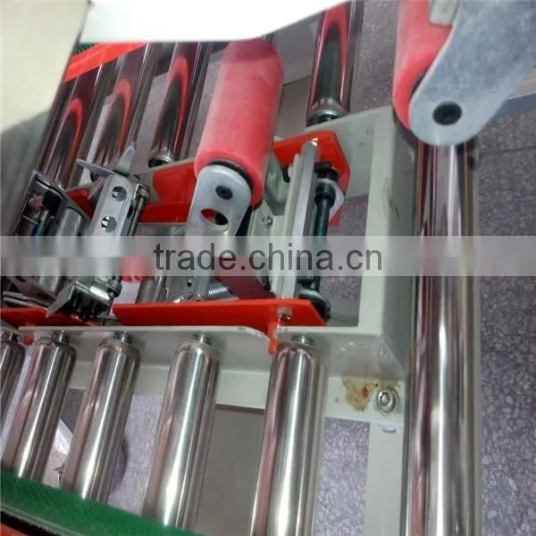Top and bottom carton box sealing machine