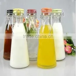 Wholesale beverage glass bottles glass juicer bottle with swing top lids