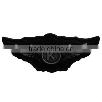 Handmade eagle wing metal badge