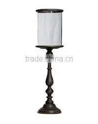 black metal and glass hurricane candle holder