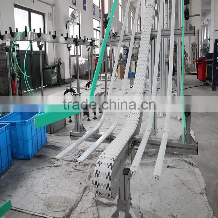 bottle lifting vonveyor system width adjustble