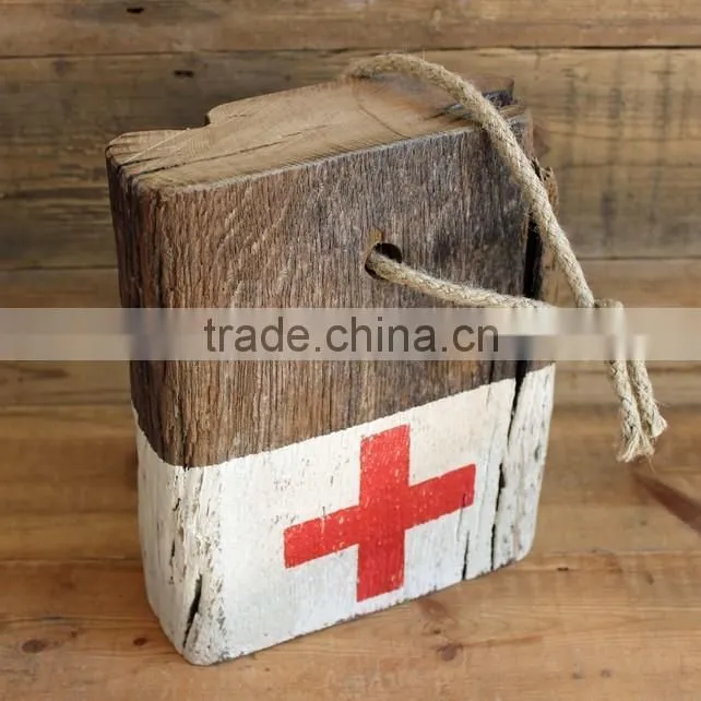 older aged wooden door stop