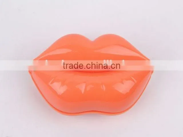 Lip shaped plastic massage comb with mirror/hair brush
