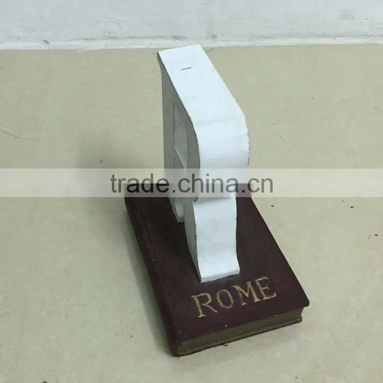 Polyresin book with letter figure
