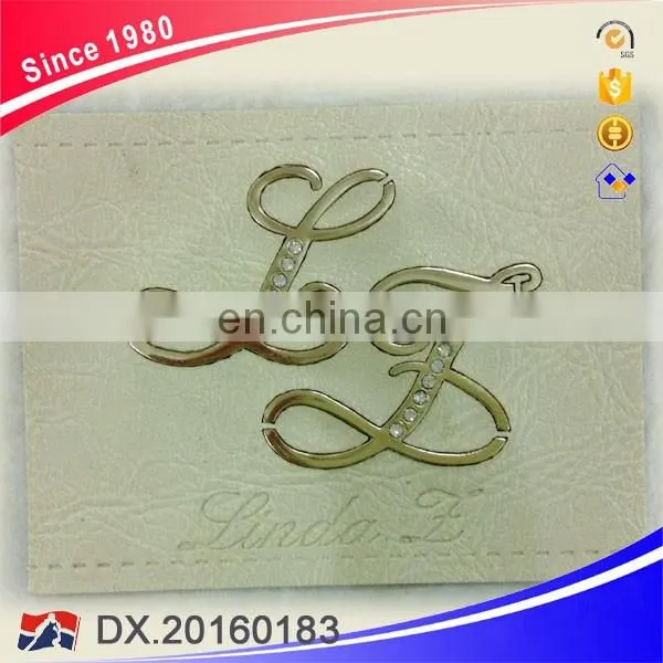 Special PU Leather and Zinc Alloy Metal Label with Carved Letter, High Quality