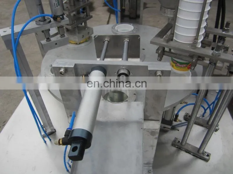 rotary table ice crame small plastic cups filling and sealing machine