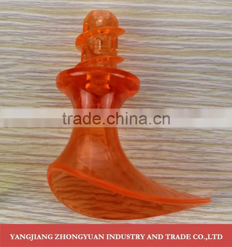 Plastic trumpet shaped hand lemon squeezer