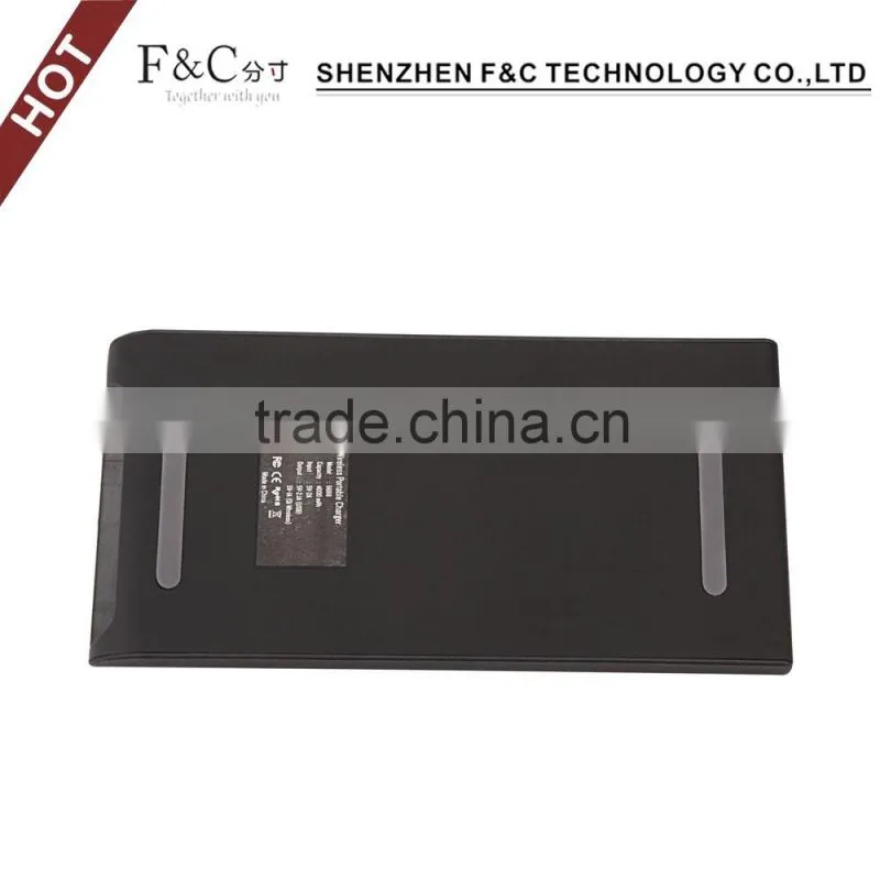 F&C qi standard wireless charger for multiple phones qi wireless 6000 mAh smart power bank Charge Two Device at the same time