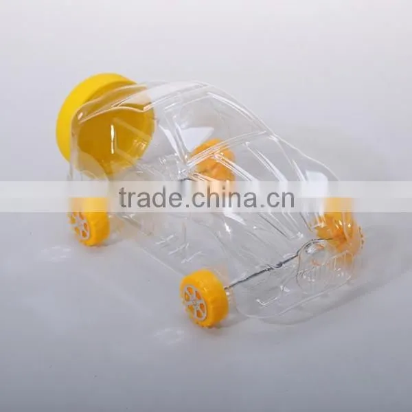 Small cute clear plastic bottles in toy shaped for candy