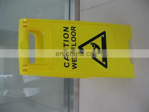 yellow warning sign used in wet floor