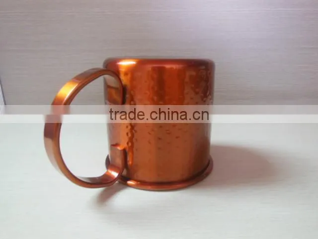 Stainless steel hammered cup finished in painted, stainless steel mug
