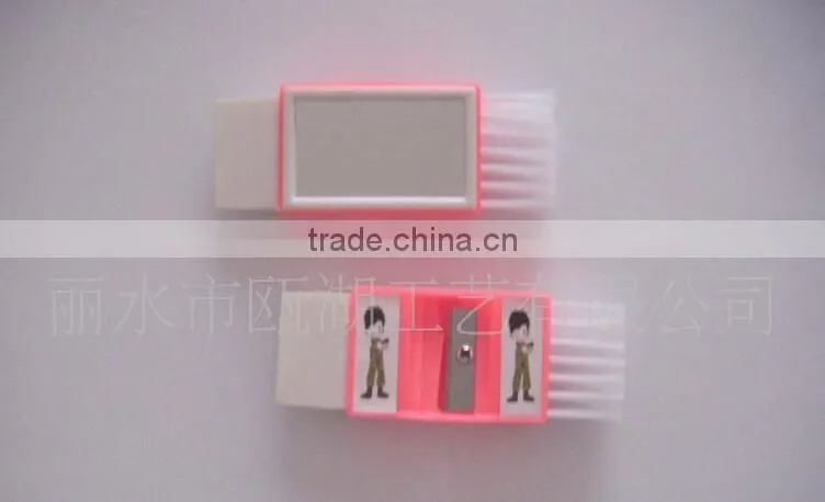 Plastic sharpener with eraser and brush