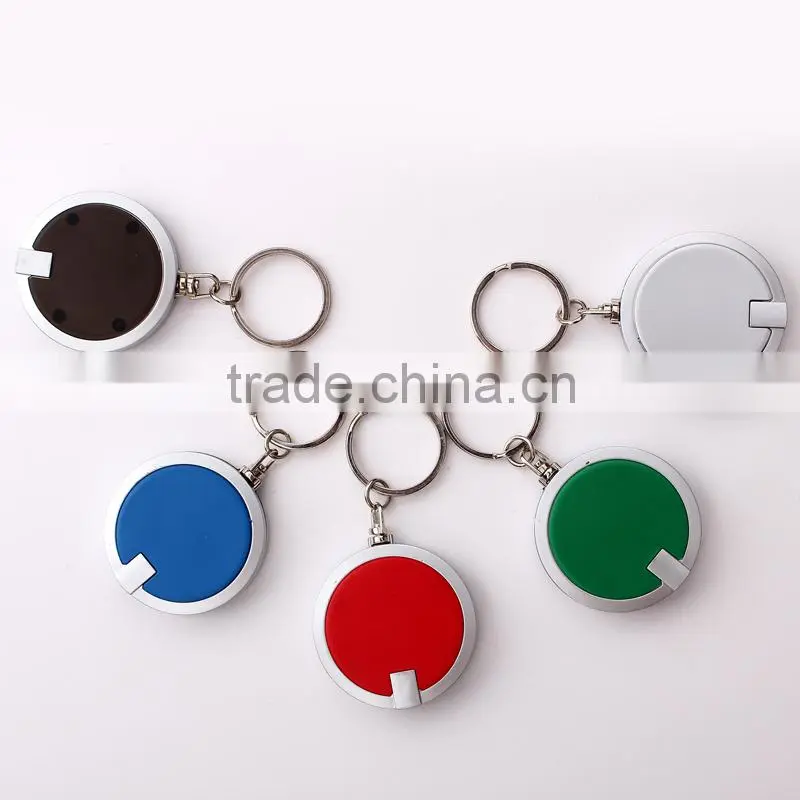 Round flashlight keychain