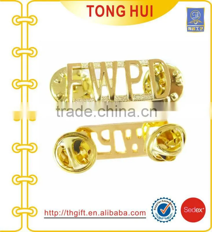Metal badges with fan-shaped design